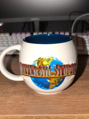 Vintage 2012 Universal Studios 3D Embossed Globe Coffee Mug White Blue